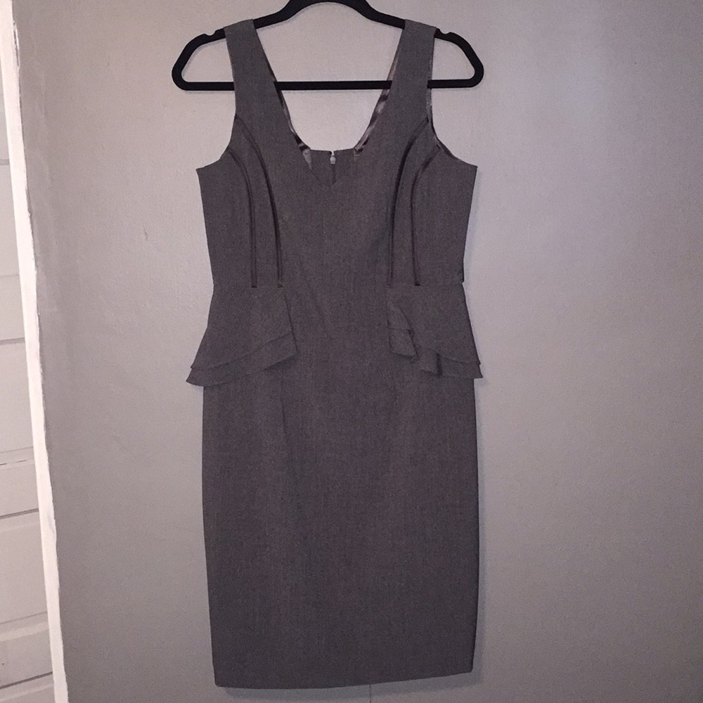 Grey peplum dress.